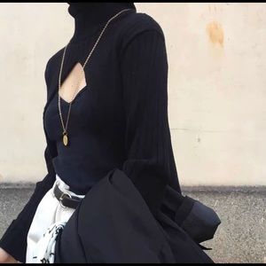 Sweater cape with hood